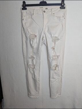 Garage Cream Heavily Distressed Skinny Jeans